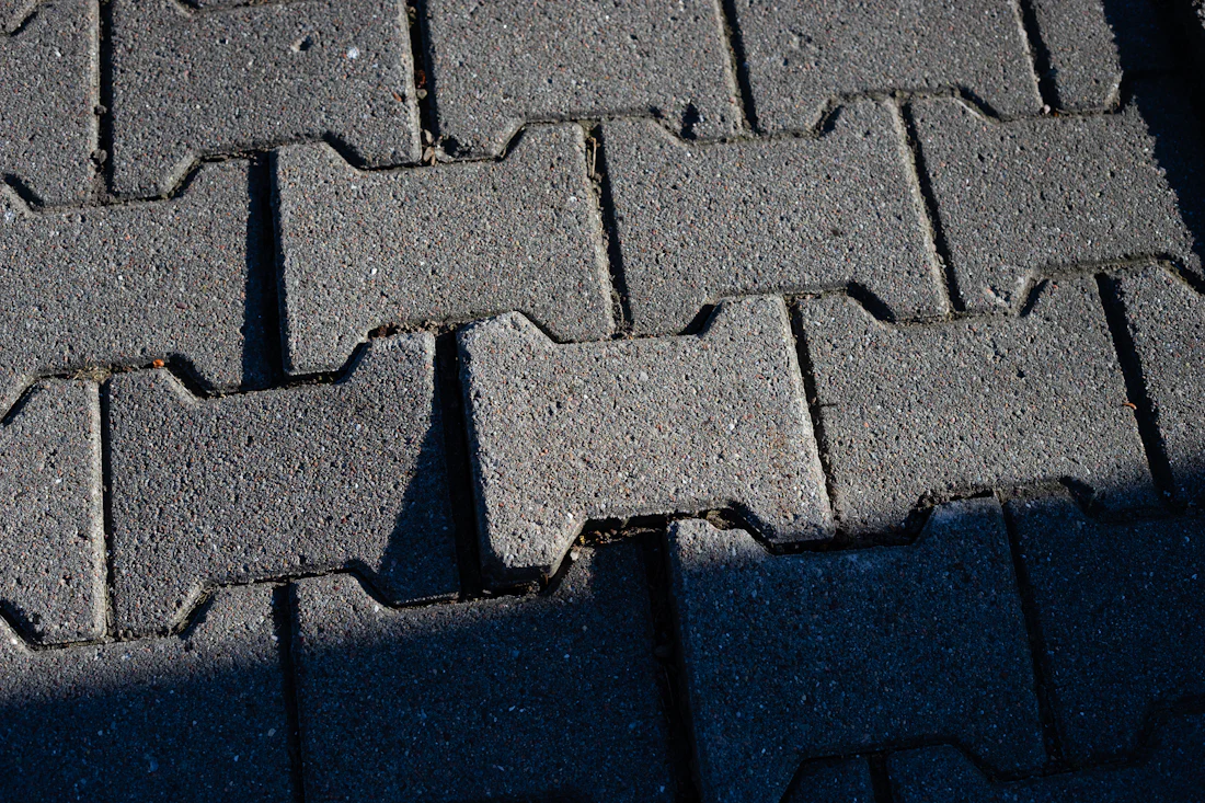 Grey interlocking concrete pavers